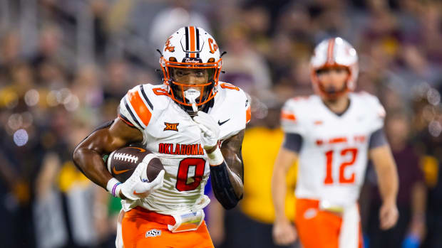 Sep 9, 2023; Tempe, Arizona, USA; Oklahoma State Cowboys running back Ollie Gordon II (0) against the Arizona State Sun Devils at Mountain America Stadium. Mandatory Credit: Mark J. Rebilas-USA TODAY Sports